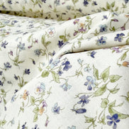 Nostalgia- Purple on Light Beige- Violets, Floral- 43” Wide- Cotton Fabric- Sevenberry
