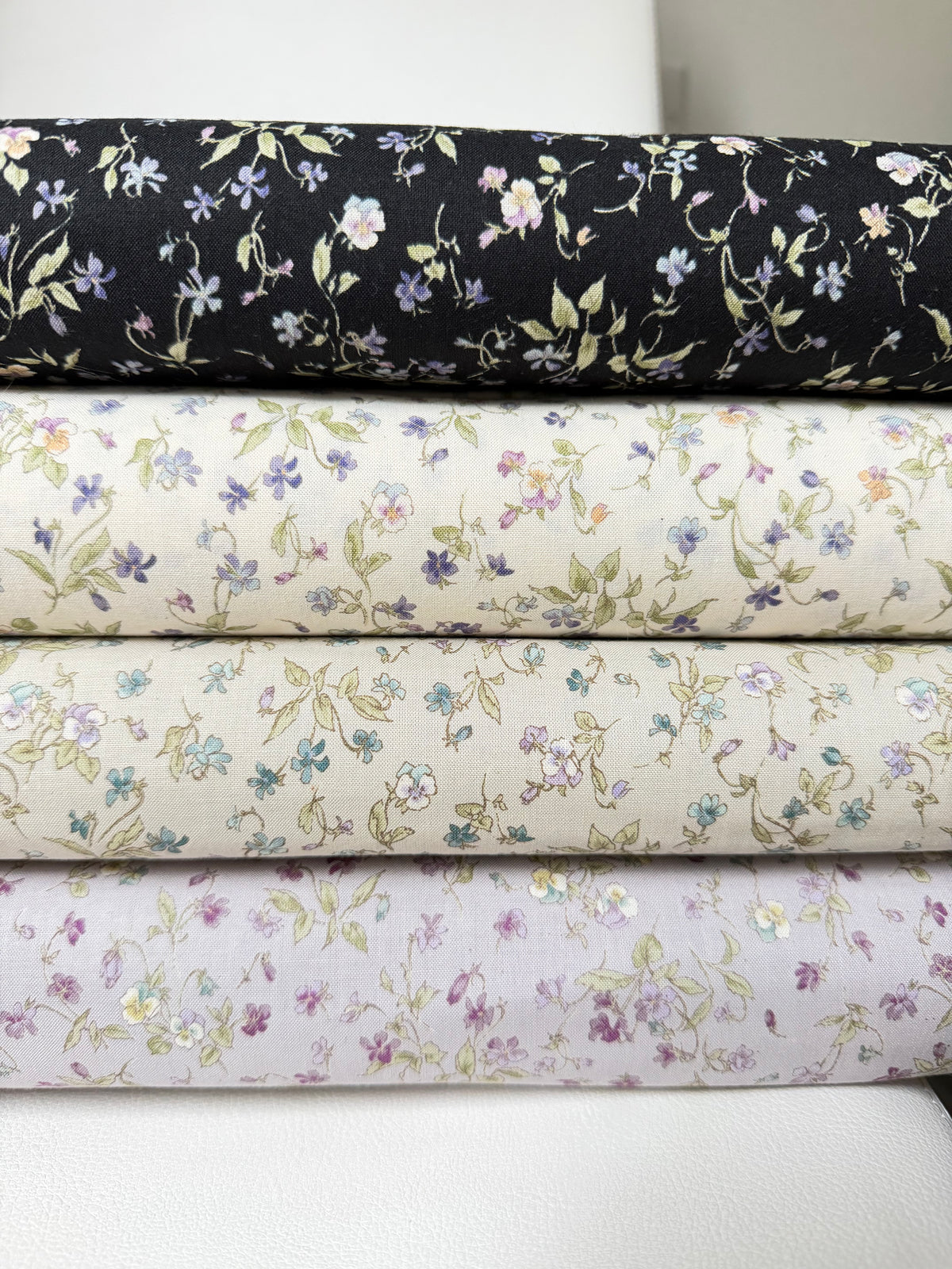 Nostalgia- Purple, Blue Teal on Black- Violets, Floral- 43” Wide- Cotton Fabric- Sevenberry
