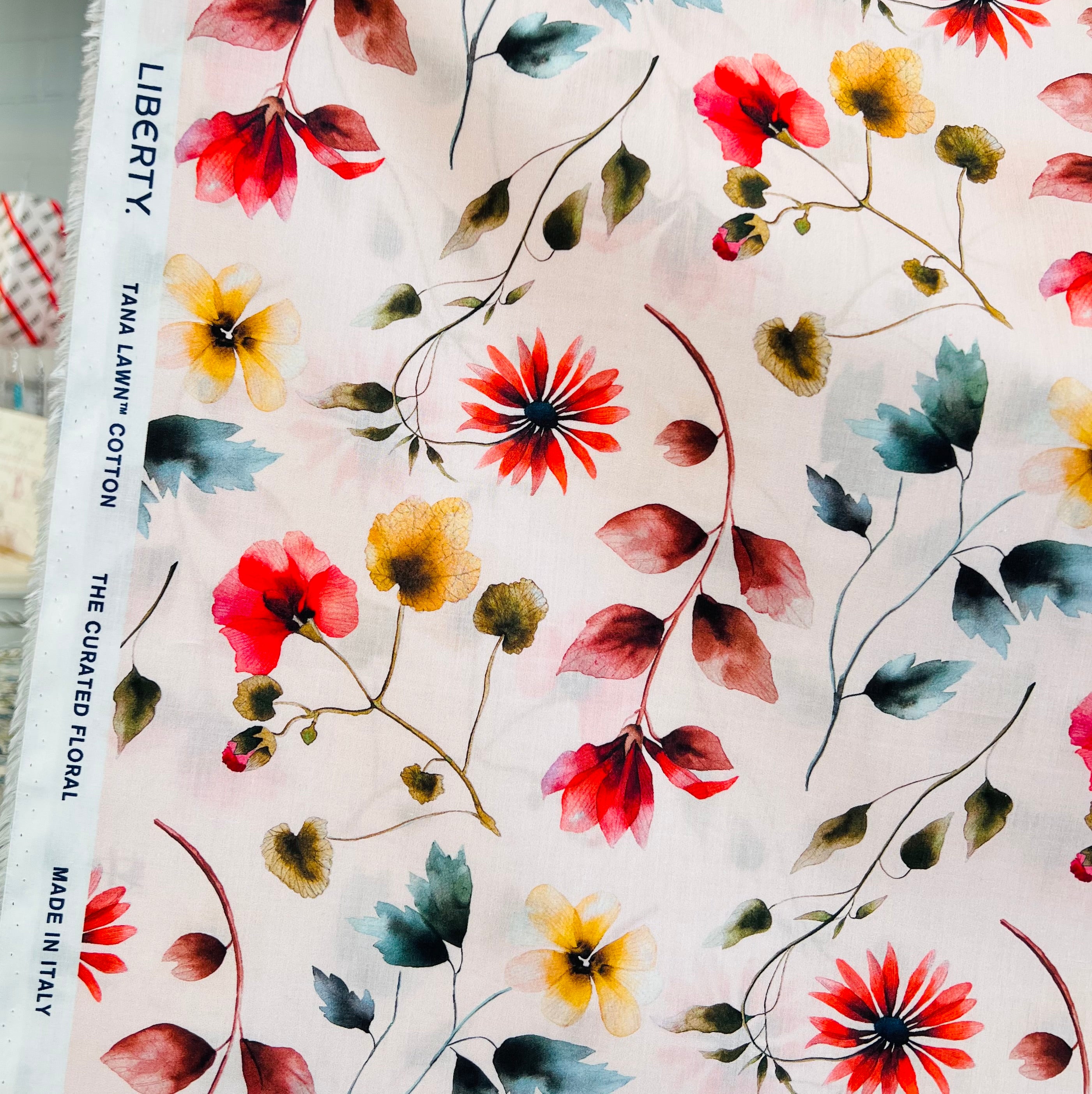 Liberty London- Herbarium (C) Tana Lawn Cotton- Red, Brown, Yellow Floral on Pale Pink Background