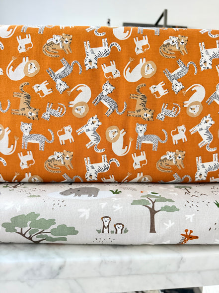 Leo & Savannah- Toss Orange- Safari Animals- Cotton Fabric- 44"