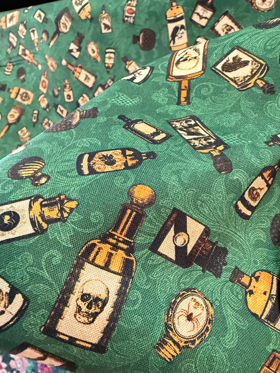 Poison Bottles, Skulls- “Dreadful Delights Balsam"- Green- 44” Wide- Cotton Fabric- Halloween