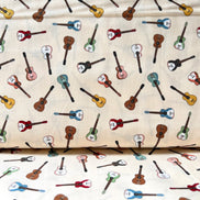 Tossed Guitars- 100% Cotton Fabric- On Cream- 44” Wide
