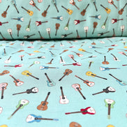 Tossed Guitars- 100% Cotton Fabric- On Light Teal/ Aqua- 44” Wide