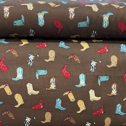 Tossed Cowboy Boots- 100% Cotton Fabric- On Brown- 44” Wide