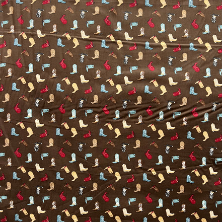Tossed Cowboy Boots- 100% Cotton Fabric- On Brown- 44” Wide