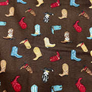 Tossed Cowboy Boots- 100% Cotton Fabric- On Brown- 44” Wide
