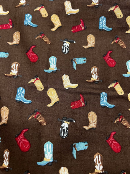 Tossed Cowboy Boots- 100% Cotton Fabric- On Brown- 44” Wide