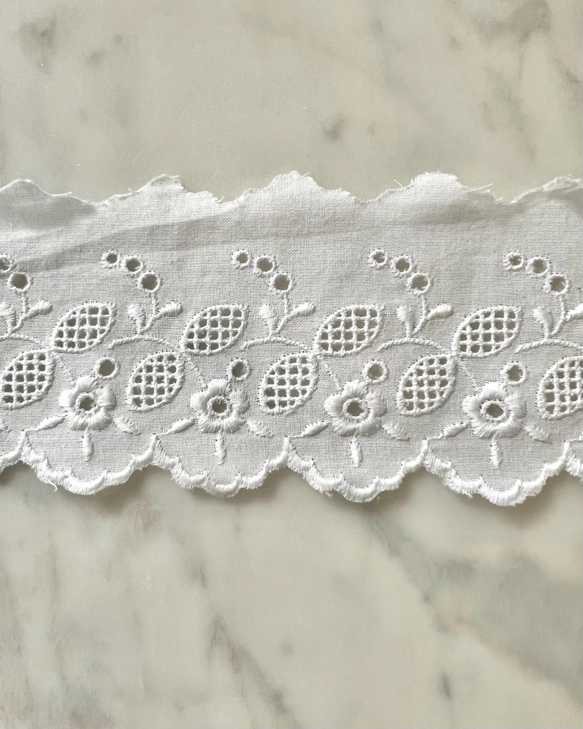 White- Flowers- 2.75″ Flat Cotton Eyelet- 5608