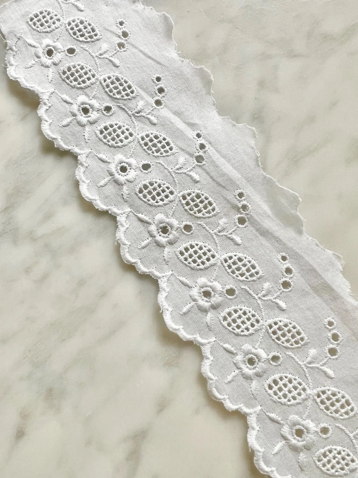 White- Flowers- 2.75″ Flat Cotton Eyelet- 5608