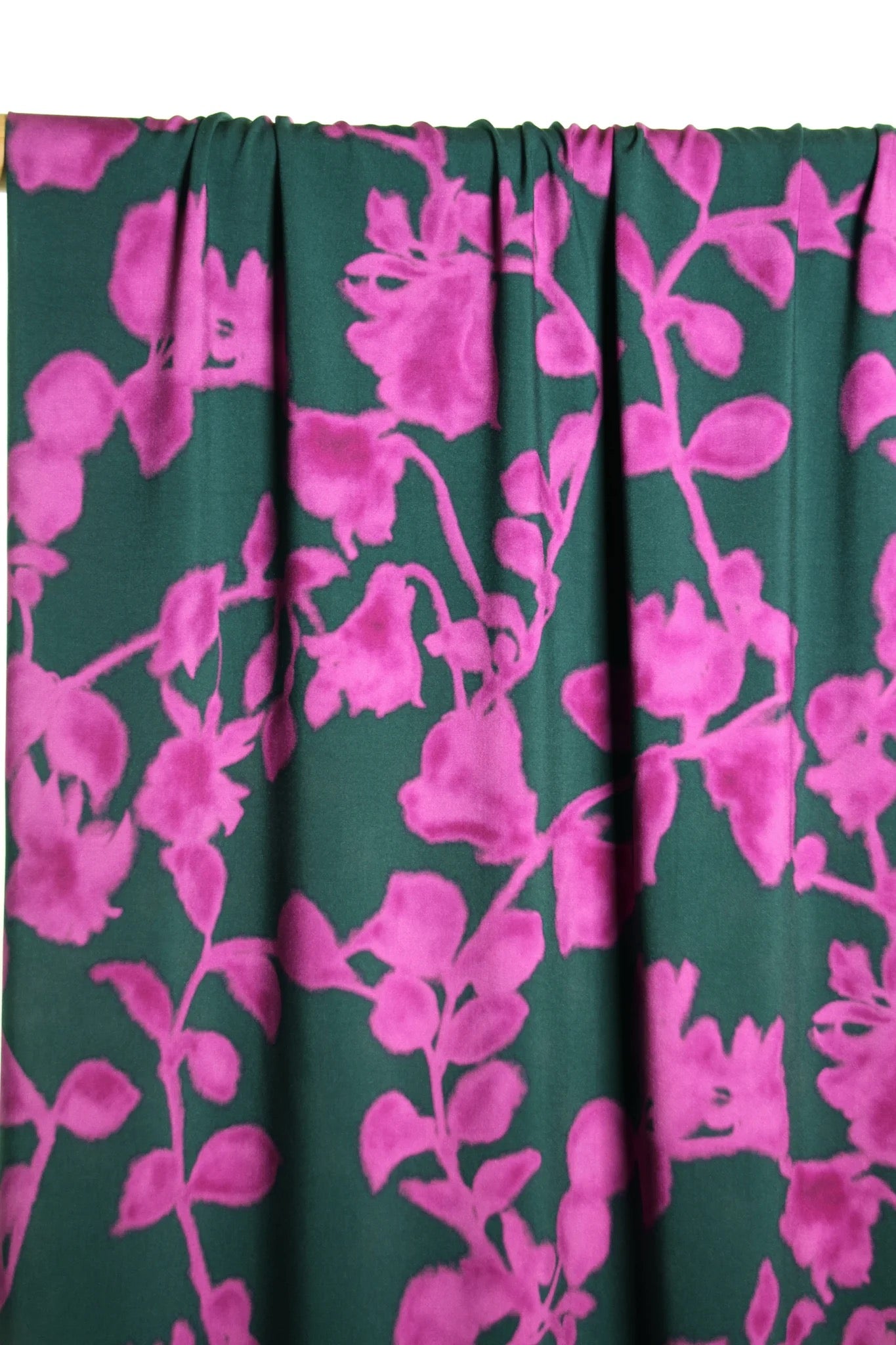 Atelier Jupe- Fuchsia Flowers on Dark Green Viscose Fabric- 57” Wide